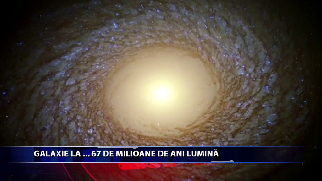 Galaxie la 67 de milioane de ani lumina