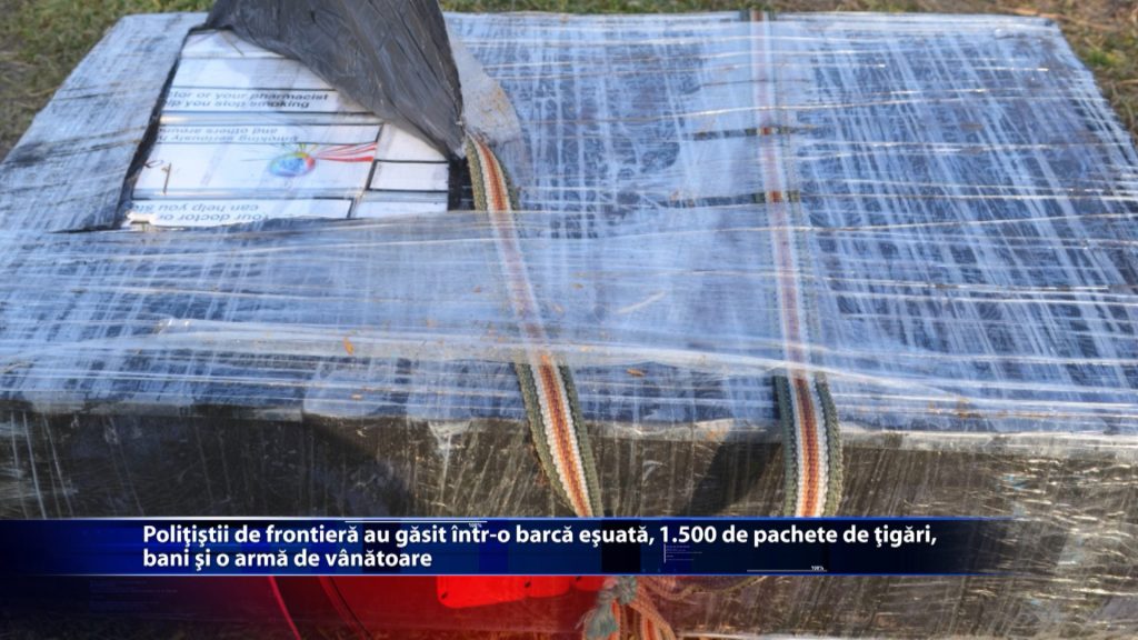 Politistii de frontiera au gasit intr-o barca esuata, 1.500 de pachete de tigari, bani si o arma de vanatoare