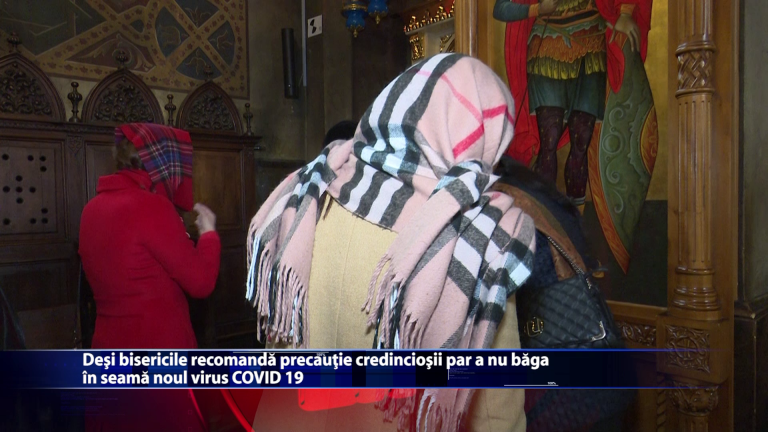 Desi bisericile recomanda precautie credinciosii par a nu baga de seama noul virus COVID 19