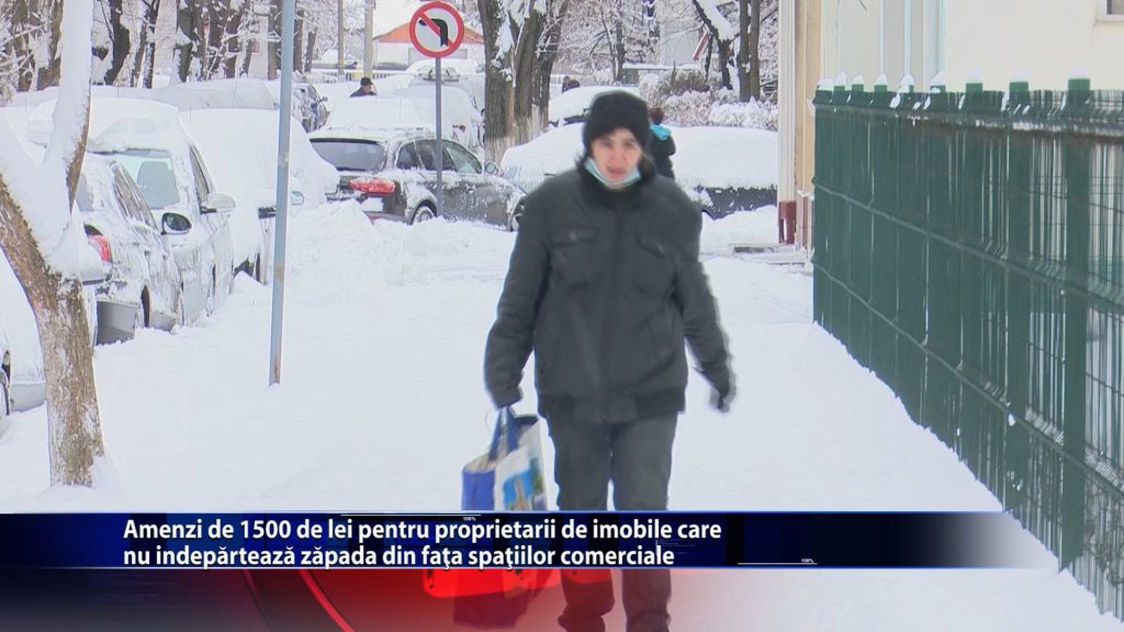 Amenzi de 1.500 de lei pentru proprietarii de imobile care nu indeparteaza zapada din fata spatiilor comerciale