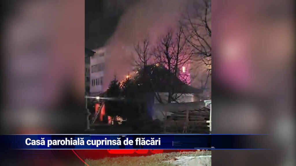 Casa parohiala cuprinsa de flacari